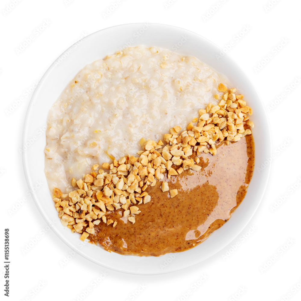 Oatmeal with peanuts and peanut butter, on a white background, isolated. Top view. Breakfast Oatmeal with peanuts and peanut butter, on a white background, isolated. Top view. Breakfast