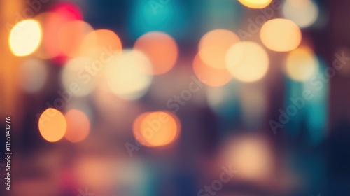 Blurred bright glowing lights of district in megapolis under dusk sky in evening on blurred background