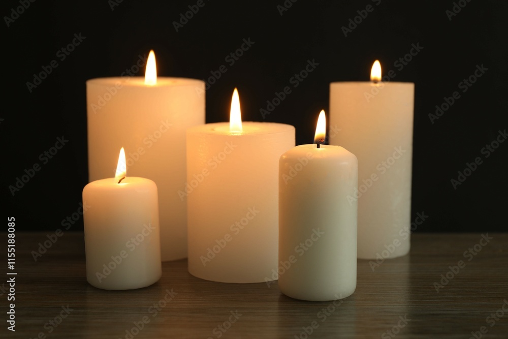 Burning candles in a dark space Burning candles in a dark space