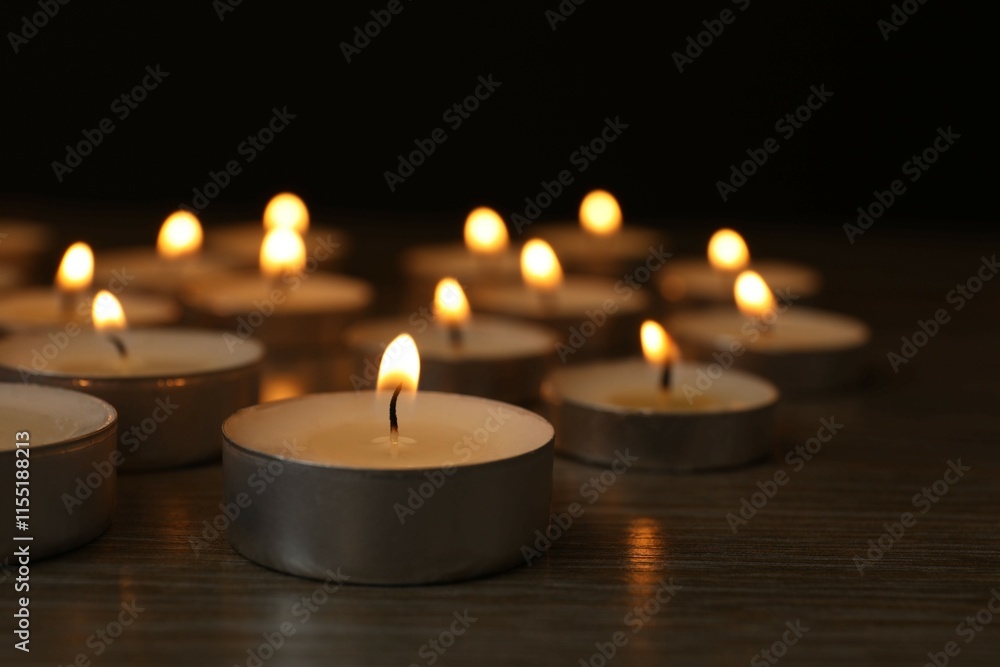 Burning candles in a dark space Burning candles in a dark space