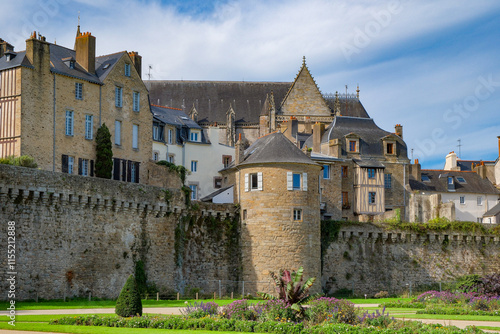 citywall with tower, church and houses in Vannes in France photo