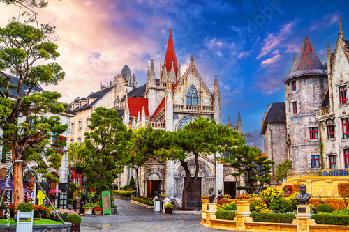 Schilderij op canvas Catholic church on the square in the French village in Ba Na Hills Park in Da Na