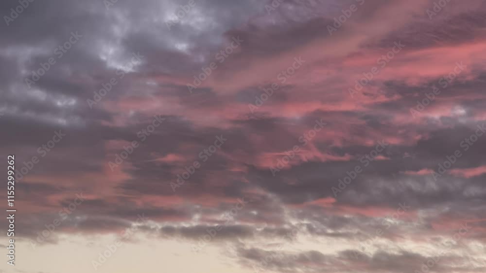 Sky landscape with clouds pink color becoming even more intense Sky landscape with clouds pink color becoming even more intense