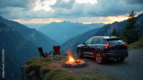 Picnic on a cliff with a fire and a car in the evening against the backdrop of mountains