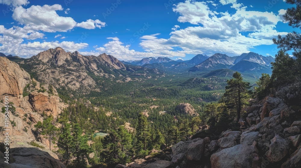 Obraz premium Panoramic view of Sierra mountain range showcasing lush greenery and dramatic clouds under a bright blue sky