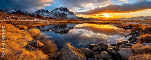 Golden sunset reflecting on a mountain lake in kamchatka peninsula photo