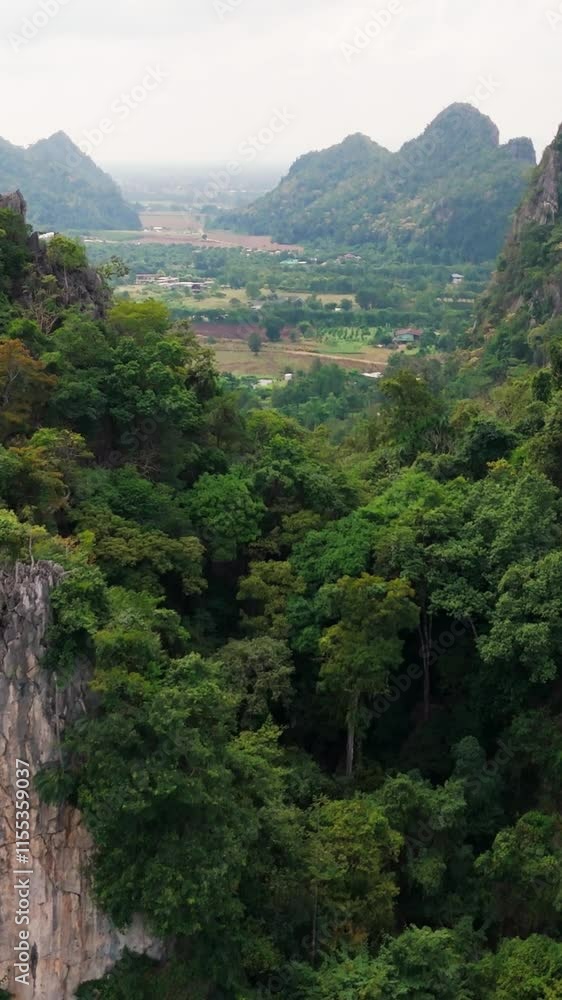 vertical Aerial of Ban Chai Khao limestone mountains in Thailand Uthai Thani province vertical Aerial of Ban Chai Khao limestone mountains in Thailand Uthai Thani province
