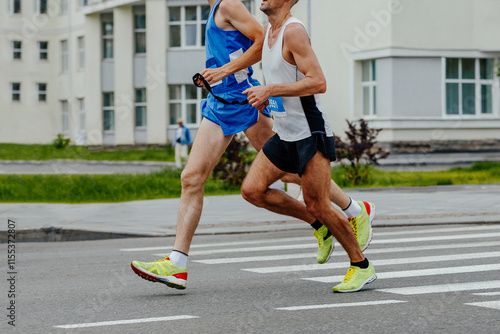 Bild auf Leinwand blind runner with his guide running city marathon