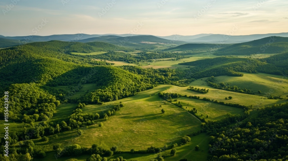 Obraz premium Serene Green Hills and Valleys Landscape