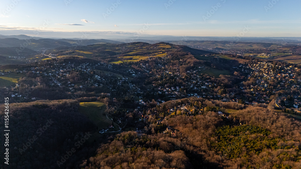 Aerial View of Austrian Villages and Wild Forests: Drone Footage of Austria's Untouched Nature, showcasing the breathtaking beauty of remote landscapes. Aerial View of Austrian Villages and Wild Forests: Drone Footage of Austria's Untouched Nature, showcasing the breathtaking beauty of remote landscapes.