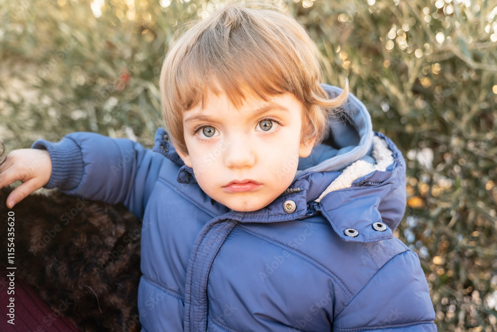 Little blue eyed caucasian boy looking at camera Little blue eyed caucasian boy looking at camera