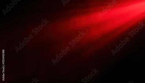 a red spotlight beam shining dramatically against a black background
