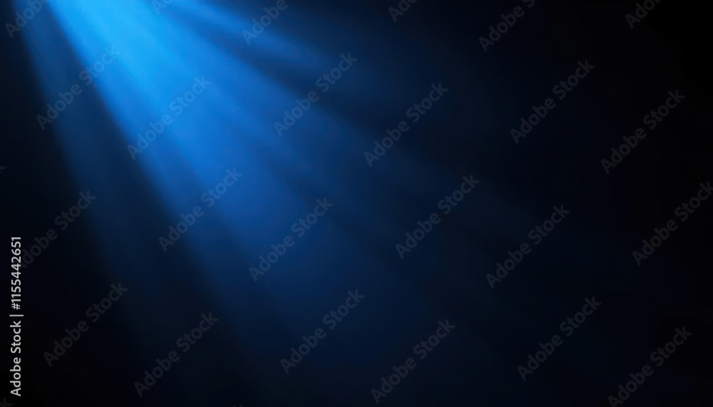 Fototapeta premium Radiant Blue Light Beams Shining on a Dark Background