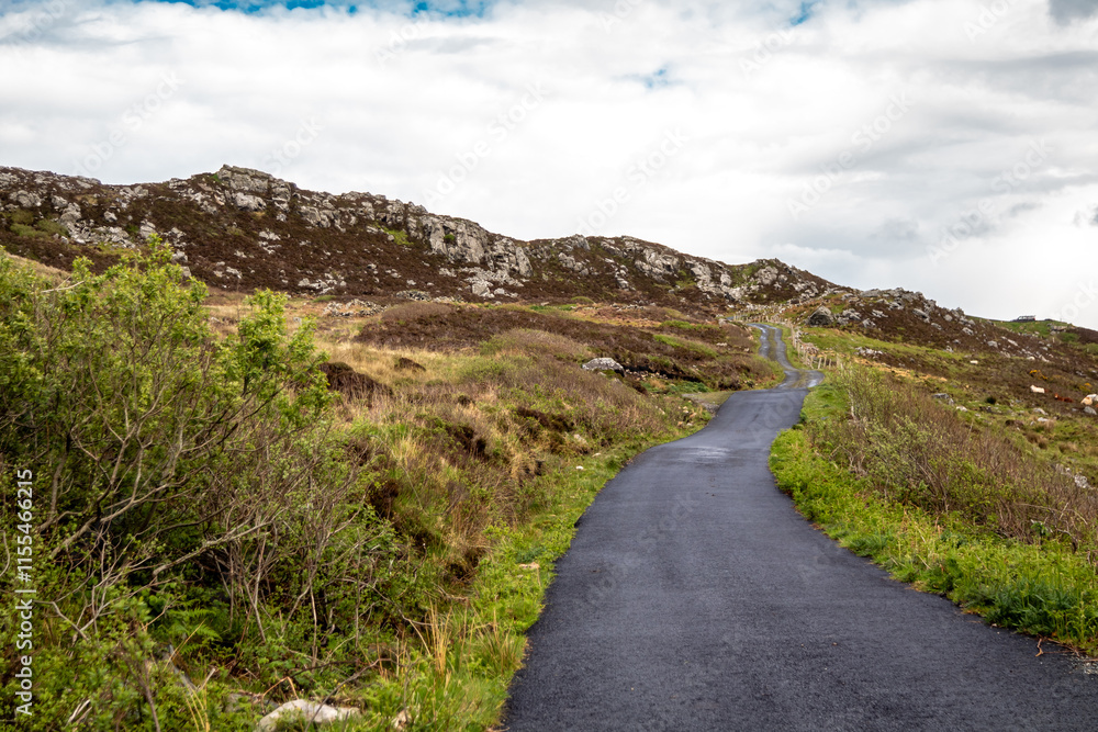 The coastal single track road between Meenacross and Crohy Head south of Dungloe, County Donegal - Ireland The coastal single track road between Meenacross and Crohy Head south of Dungloe, County Donegal - Ireland