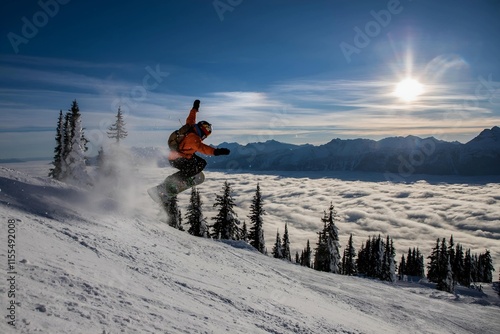 Freerider skier descends from the mountain in the light of the morning sun photo