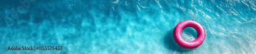 Top view of pink swimming tube on blue water, banner