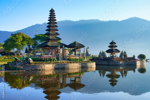 Morning view of Ulun Danu Beratan Temple on the lake. The most iconic and famous temple in Bali surrounded by mountains photo