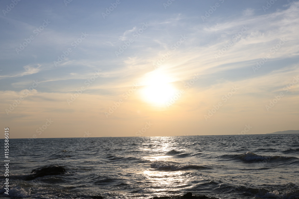 Horizon Sea Sky Background, Sunset sky clouds over the sea in the evening with Orange and yellow sunlight Golden hour in the Summer landscape, Dusk sky seascape backgrounds