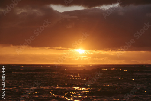 Gorgeous sunset with rain and clouds as a cyclone passes through Mauritius Island photo