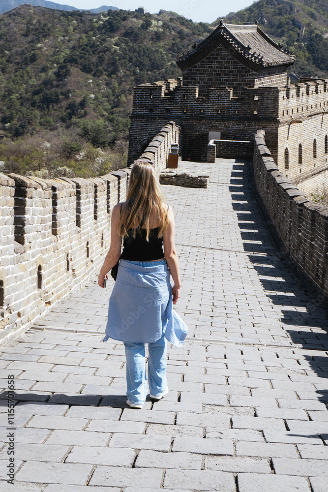 Walking along the Great Wall of China on a sunny day Walking along the Great Wall of China on a sunny day