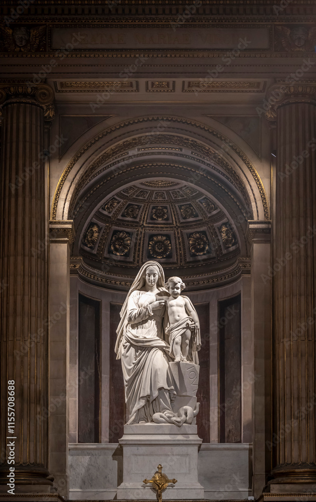 Fototapeta premium Paris, France - 12 18 2024: View detail of Litany of the Holy Virgin statue inside Madeleine church.