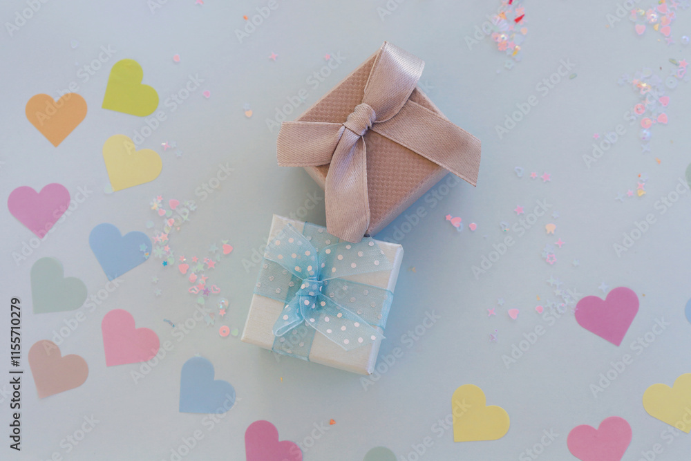 Obraz premium valentines day, gifts on a blue background and hearts.