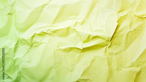 top view on light green color crumpled paper, texture background  
