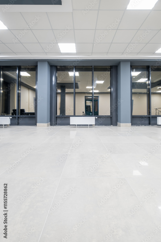 panorama view in empty modern hall with columns, doors and panoramic windows at night panorama view in empty modern hall with columns, doors and panoramic windows at night