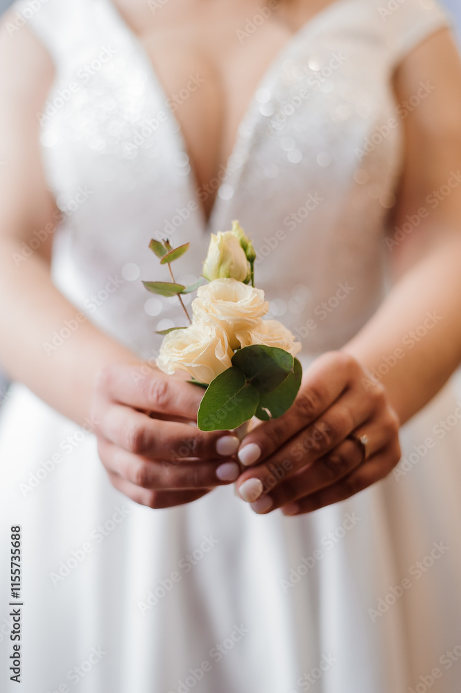 Elegant Bride Holding a Beautiful Floral Bouquet in a Wedding Dress Elegant Bride Holding a Beautiful Floral Bouquet in a Wedding Dress