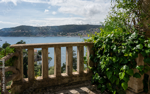 Saint-Jean-Cap-Ferrat, Provence-Alpes-Cote d'Azur, France - May 3, 2024 - Mediterranean View Through Stone Balustrade