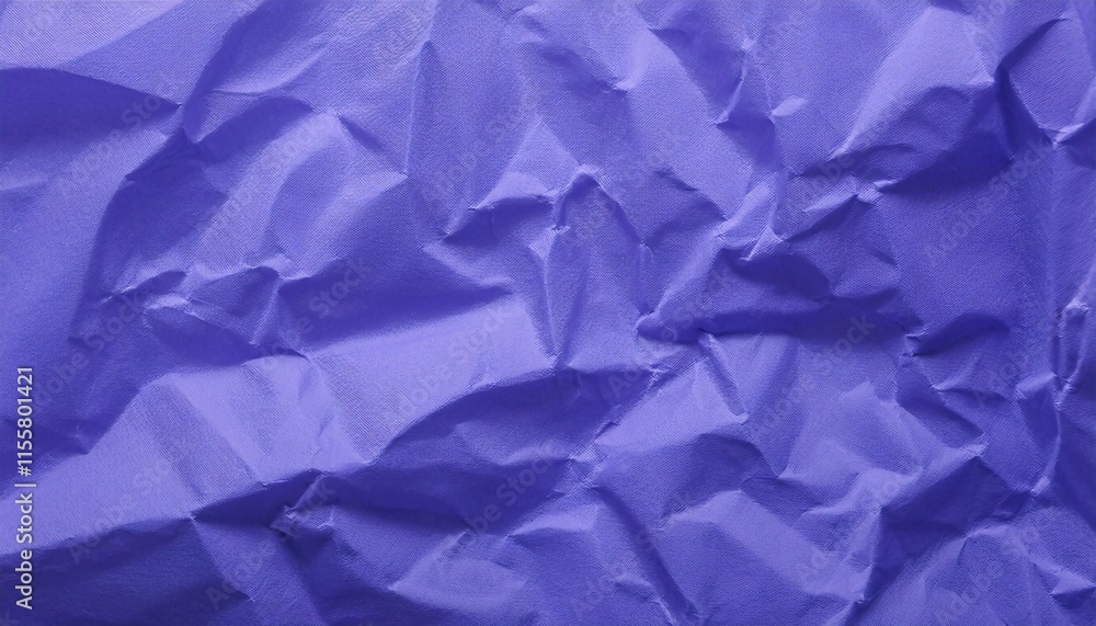 close-up of crumpled violet paper texture with intricate folds and wrinkles for creative backgrounds
