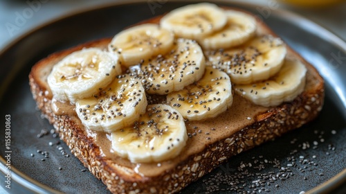 Delicious banana and peanut butter toast on whole grain bread with chia seeds