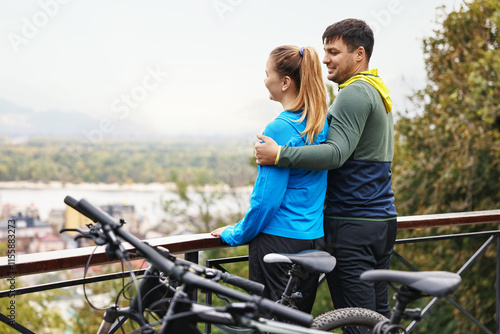 Wallpaper Mural Beautiful happy couple with bicycles spending time together outdoors Torontodigital.ca