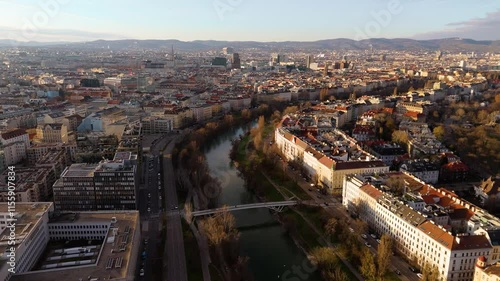 Wallpaper Mural Vienna, Austria Aerial View: Sunset Over City Center and Canal. Top cinematic aerial view. 4K drone footage Torontodigital.ca