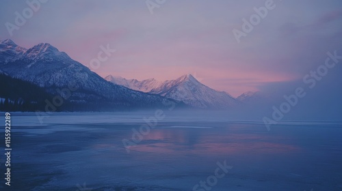 Majestic snow-capped mountains surround a vast, frozen lake under soft, ethereal dawn light