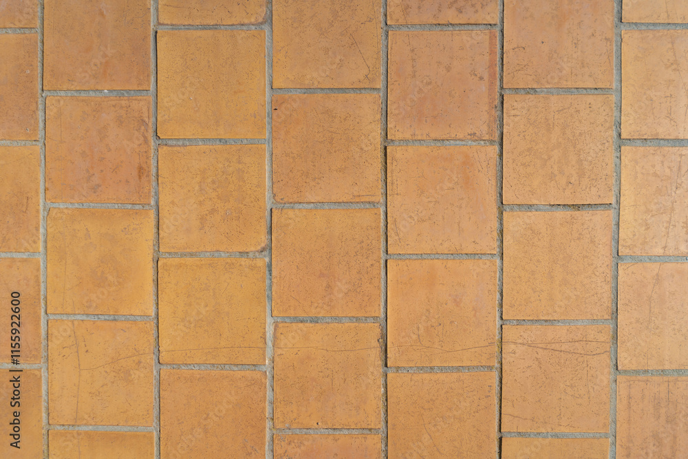 Naklejka premium Capdepera, Mallorca, Spain 26.10.2021 Geometric pattern of terracotta floor tiles showing traditional Mediterranean paving design