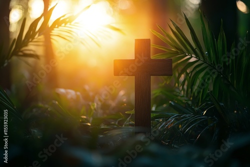 Wooden cross surrounded by lush greenery in a sunlit forest