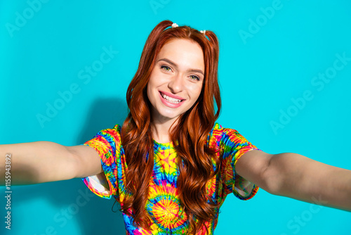 Photo of pretty young girl cheerful take selfie photo smile wear trendy colorful outfit isolated on aquamarine color background photo