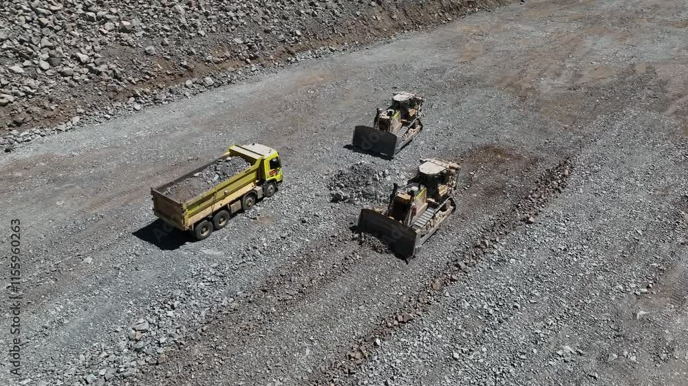 erial View of Trucks and Bulldozers at Gravel Worksite erial View of Trucks and Bulldozers at Gravel Worksite