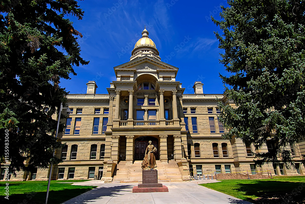 Fototapeta premium The State Capitol Building at Cheyenne Wyoming WY USA. Esther Hobart Morris is a bronze sculpture on lawn is depicting the first woman justice of the peace in the United States by Avard Fairbanks..