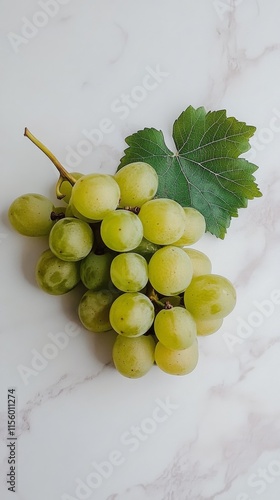 Fresh green grapes with water droplets on a light background for healthy eating