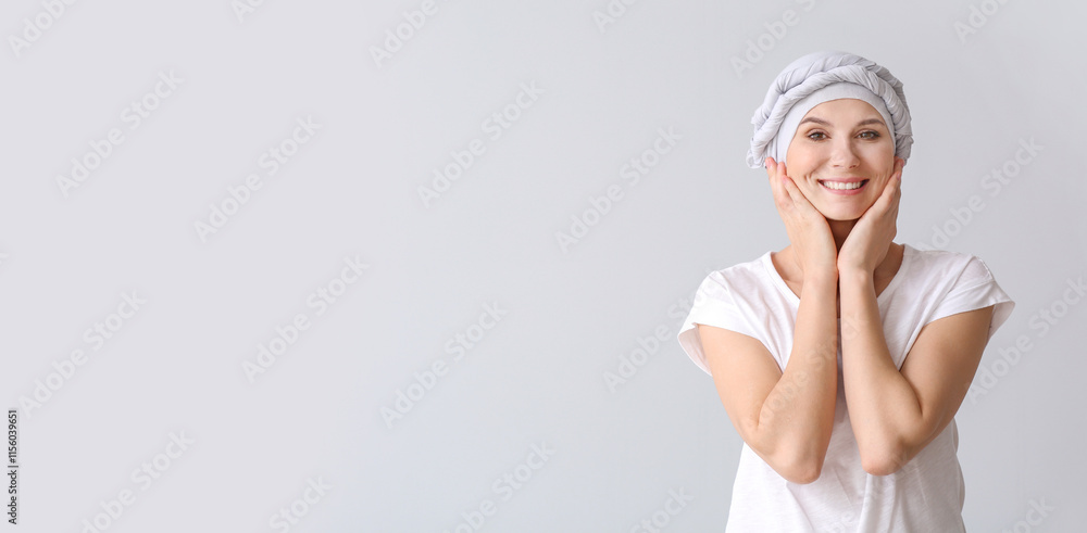 Woman after chemotherapy on light background Woman after chemotherapy on light background