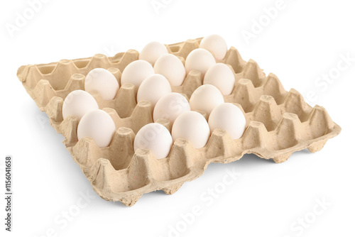 Chicken eggs in cardboard box on white background photo