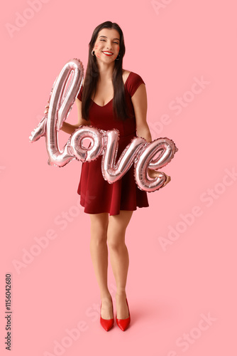 Smiling woman in red dress ...