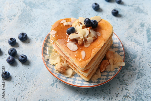 Plate with tasty pancakes i...