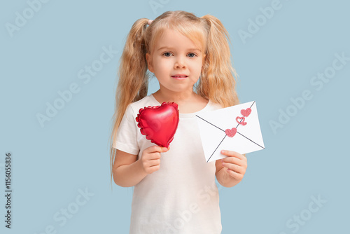 Cute little girl with envelope and heart shaped air balloon on blue background. Valentine's Day celebration