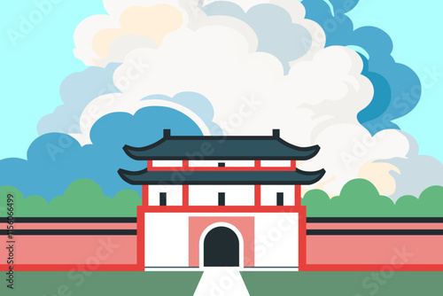A historical Chinese gate under cloudy sky.