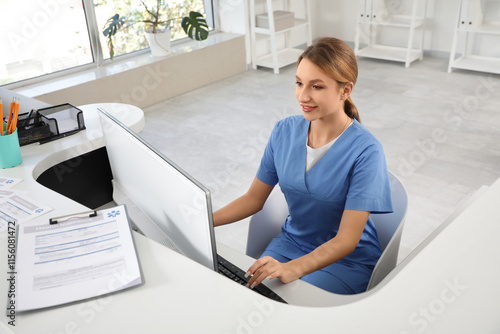 Female medical intern worki...