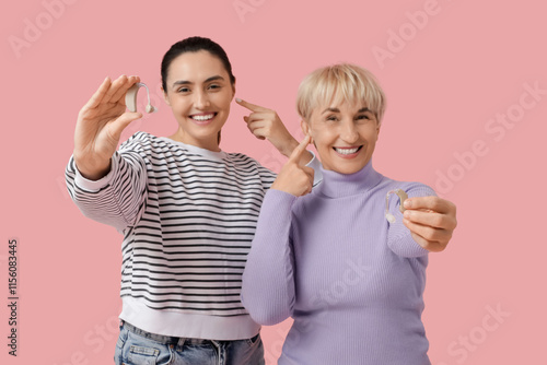 Women with hearing aids on ...