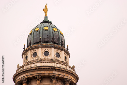 Low angle view of a historical Franzoesischer Dom. French Cathedral in Berlin, a historical landmark and popular tourist attraction. Cultural and architectural heritage, tourism and sightseeing. Copy  photo